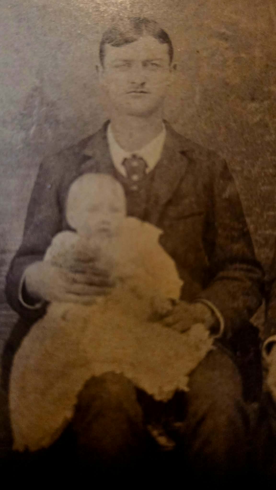 Antique Portrait of Mother, Father and infant